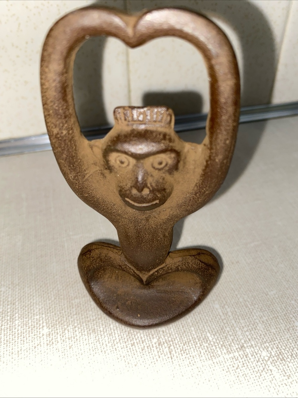 Cast Iron Monkey Bottle Opener designed by Japanese designer Tadahiro Baba